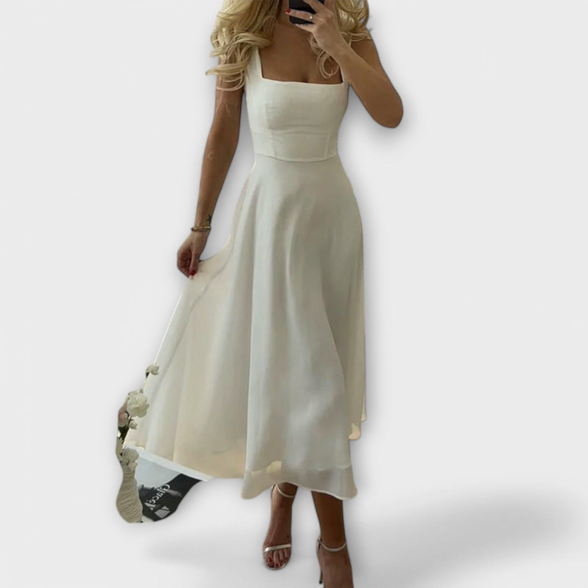 Elegant ærmeløs kjole