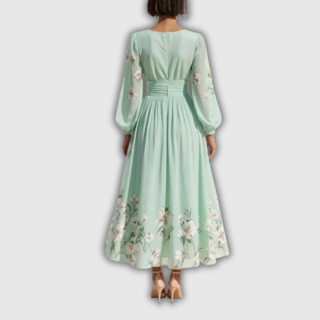 Ketty – Blomstret midikjole med flydende silhuet