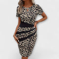 Stilfuld kjole med leopardprint