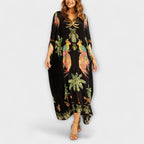 Linda – Off-shoulder-kjole med asymmetrisk skulder og palmeprint