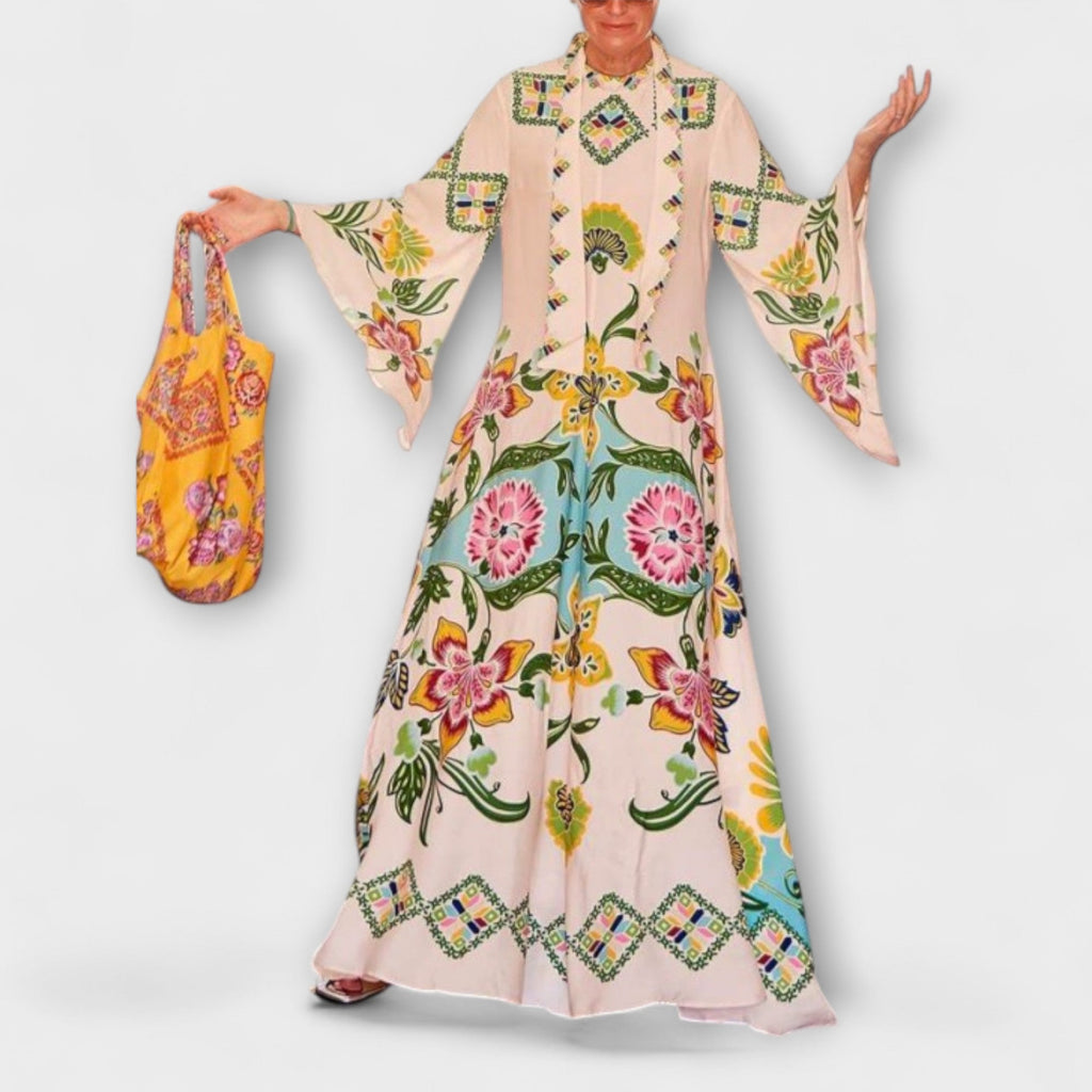 Agnete – Elegant maxikjole med blomsterprint og flydende design