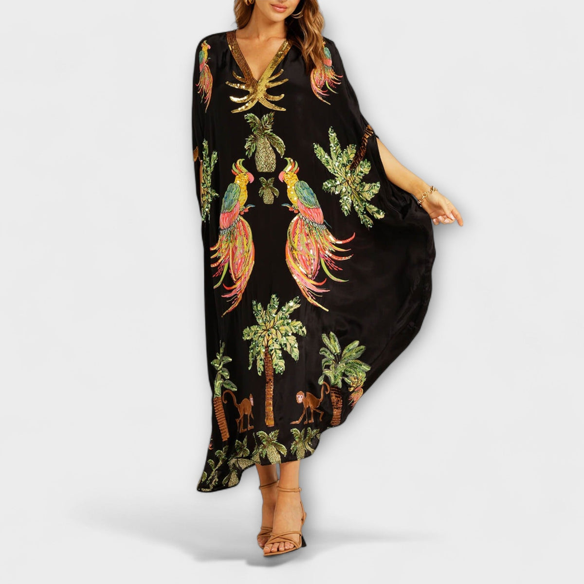 Linda – Off-shoulder-kjole med asymmetrisk skulder og palmeprint