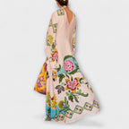 Agnete – Elegant maxikjole med blomsterprint og flydende design