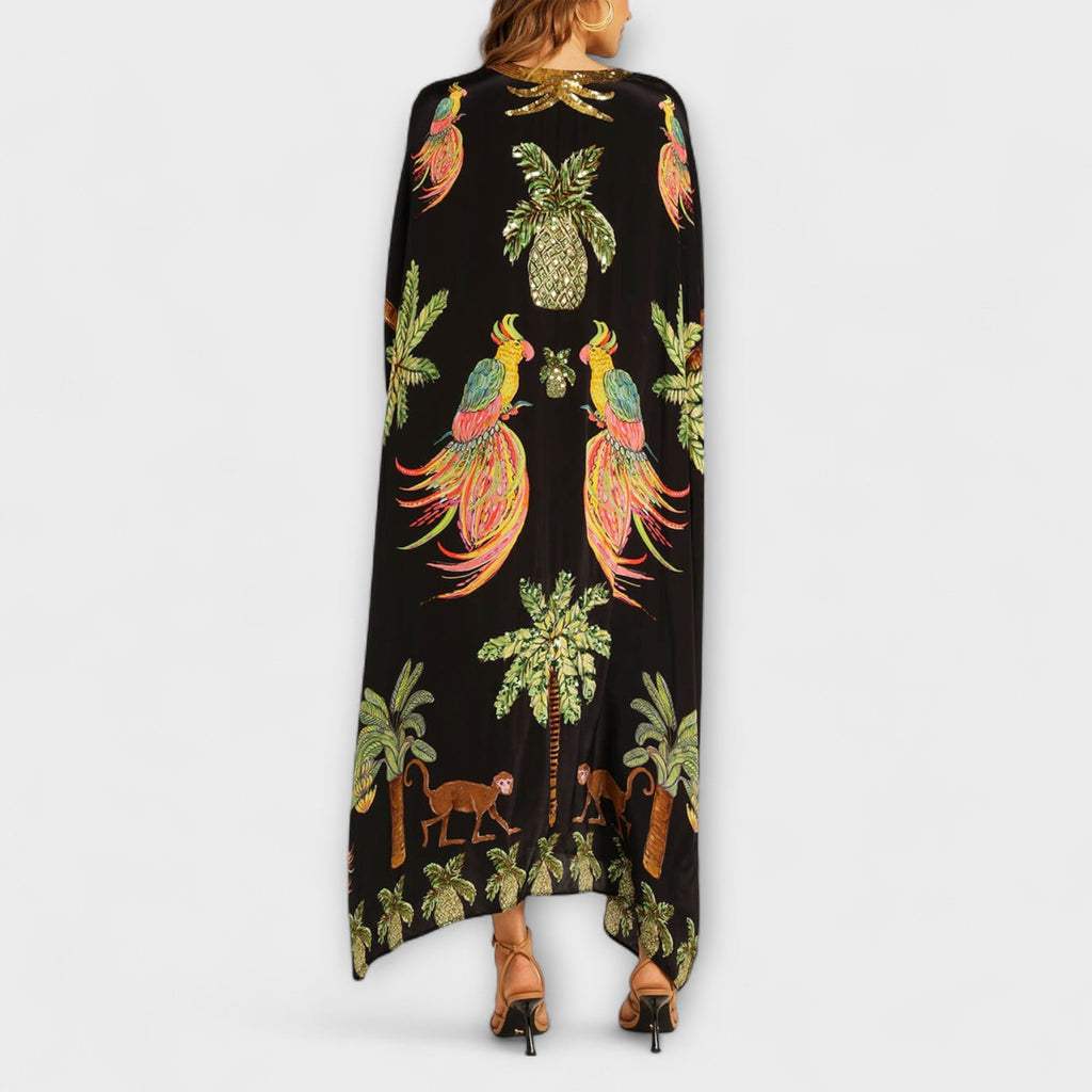 Linda – Off-shoulder-kjole med asymmetrisk skulder og palmeprint