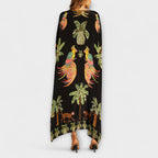 Linda – Off-shoulder-kjole med asymmetrisk skulder og palmeprint